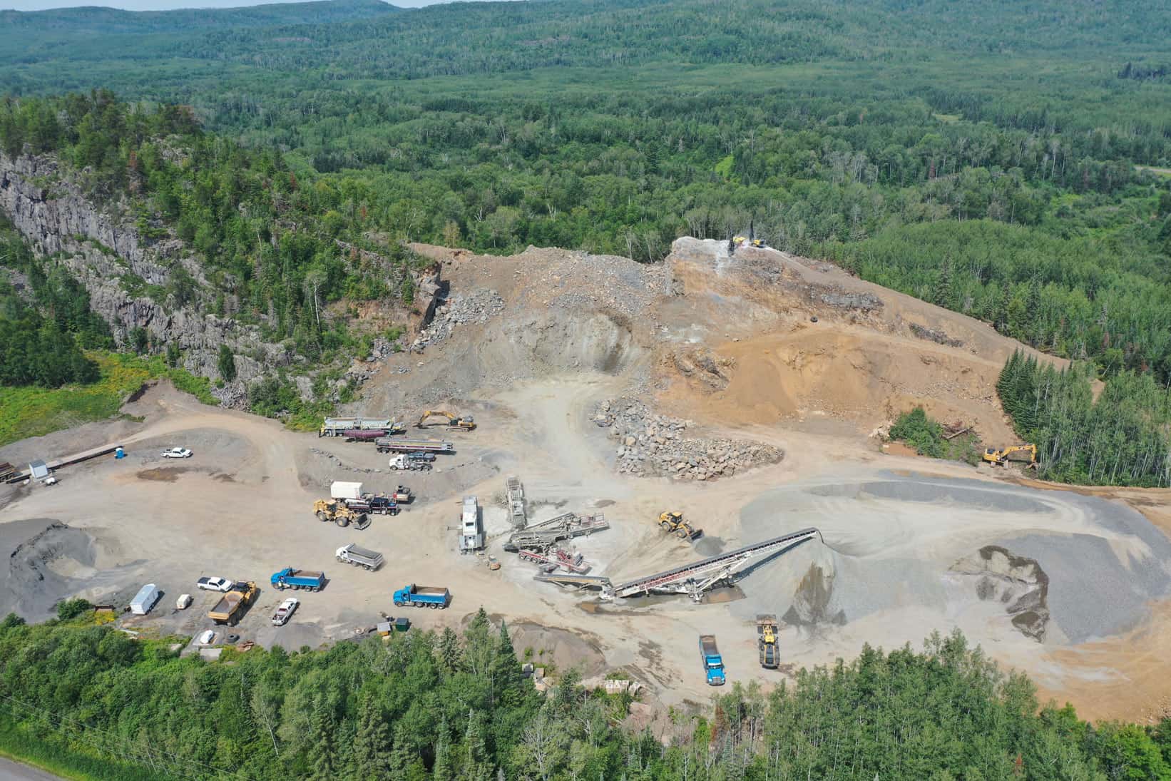 A faraway view of the LH North highway construction site. Heavy equipment looks like small toys in this bird's-eye view.